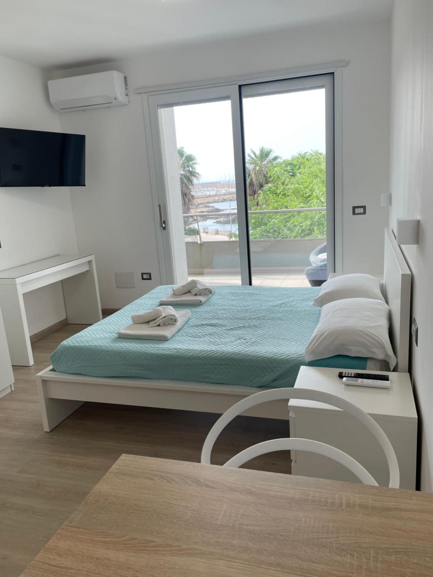 Casa Vacanza Acquamarina Porto Torres Exterior foto